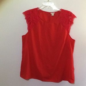 Red sleeveless shirt